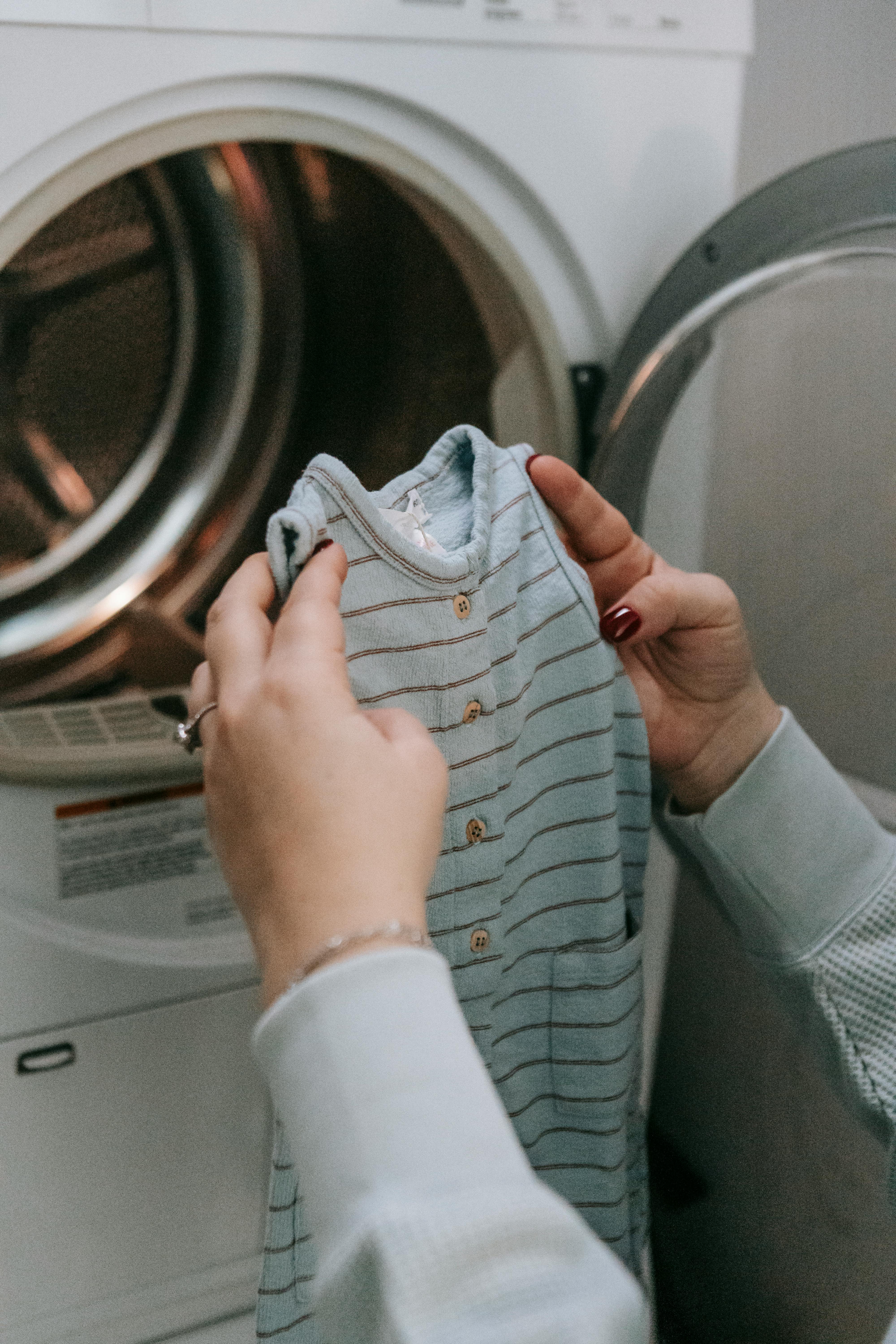 Mom removing onesie