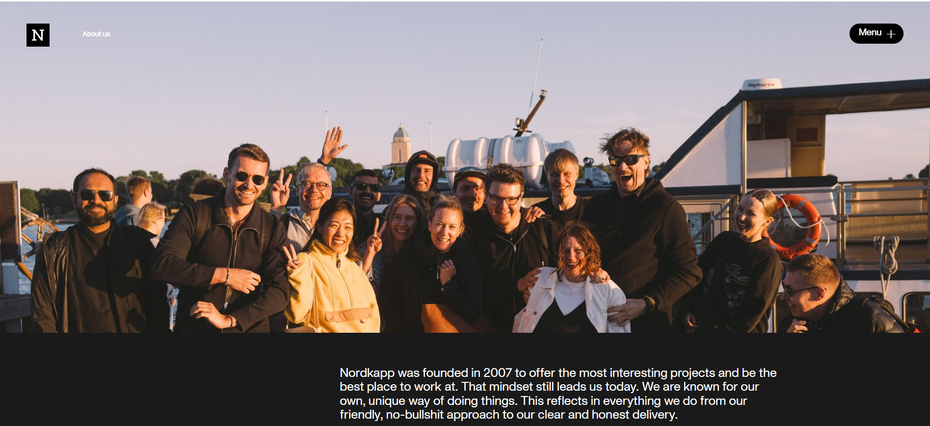 Sample website that showcases a company photo of real people as key website elements to build authenticity Sample website that showcases a company photo of real people as key website elements to build authenticity