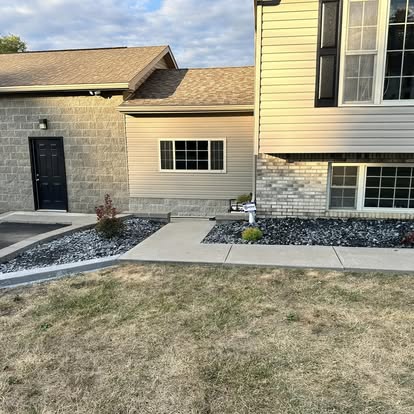 Stone landscaping in front yard