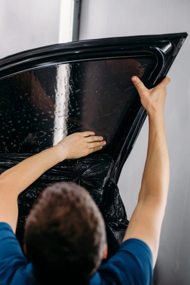 Professional window tinting application providing UV protection, heat rejection and enhanced privacy