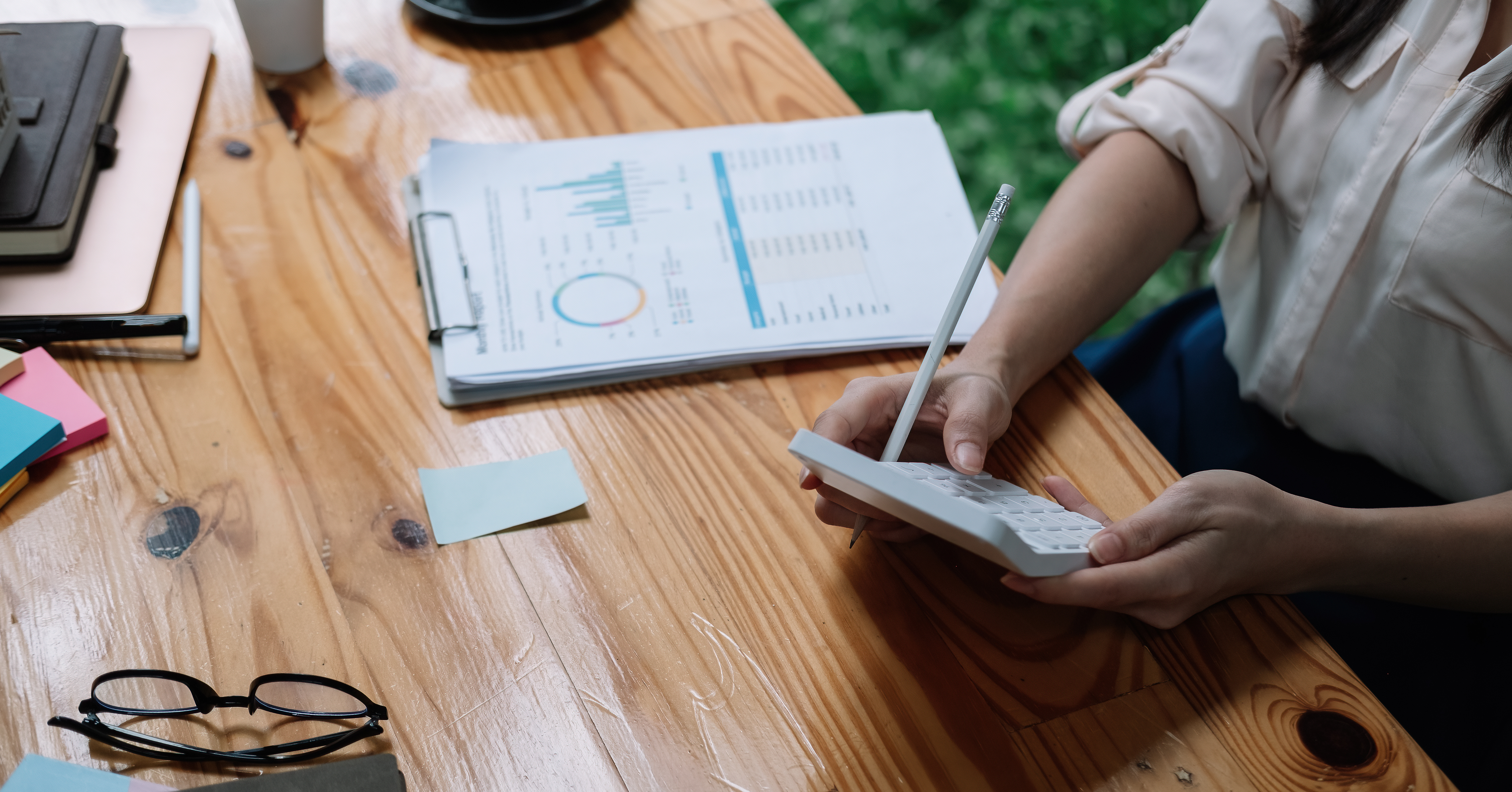 Accounting woman calculating tax deductions 