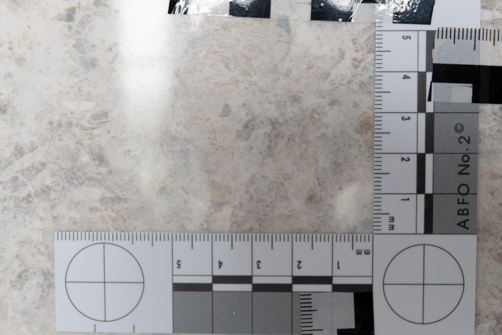 untreated fingerprint on a bathroom tile untreated fingerprint on a bathroom tile