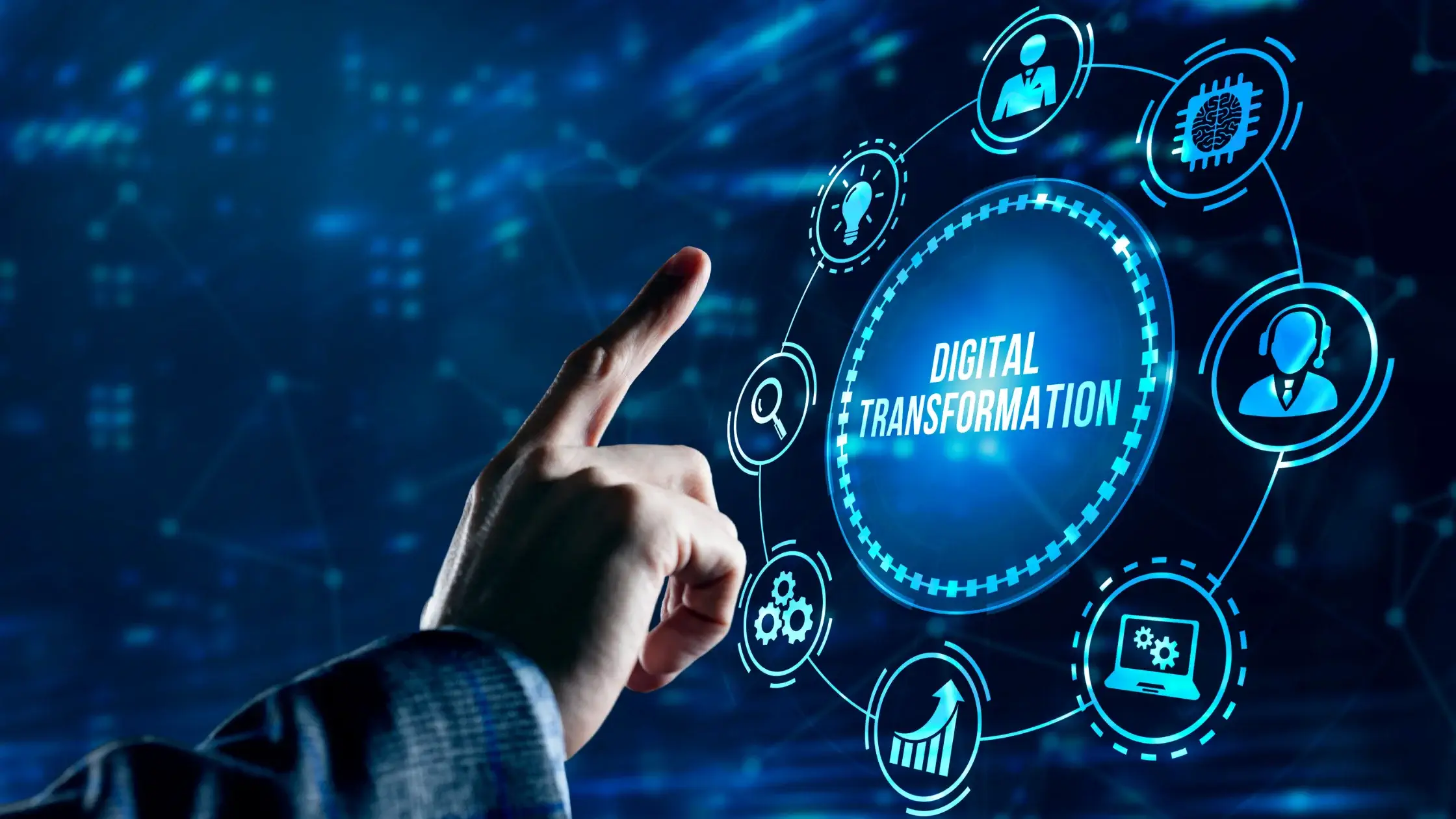 Image of a man using his finger to press digital transformation button