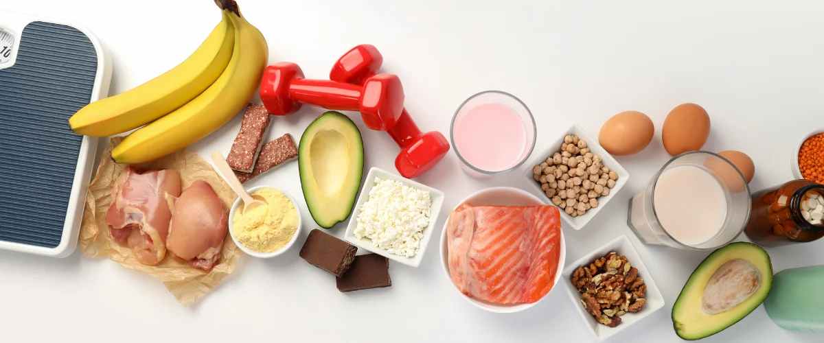 Balanced diet with healthy foods, proteins, and supplements for weight loss and fitness  Download fitness-scale-with-dumbbells.webp Balanced diet with healthy foods, proteins, and supplements for weight loss and fitness  Download fitness-scale-with-dumbbells.webp