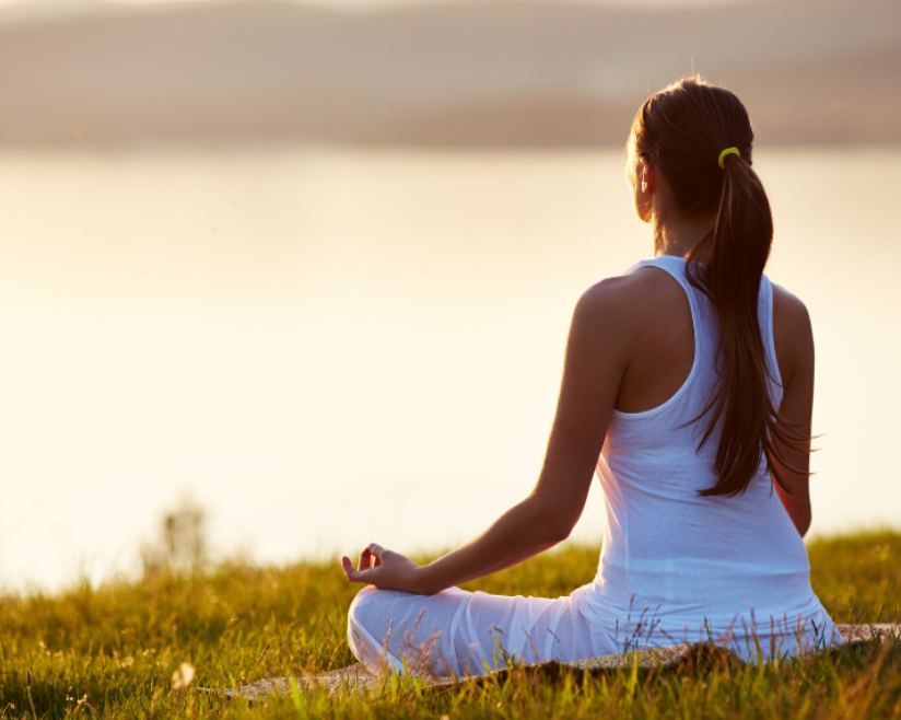 Person practicing autosuggestion through positive affirmations and mindfulness for self-improvement