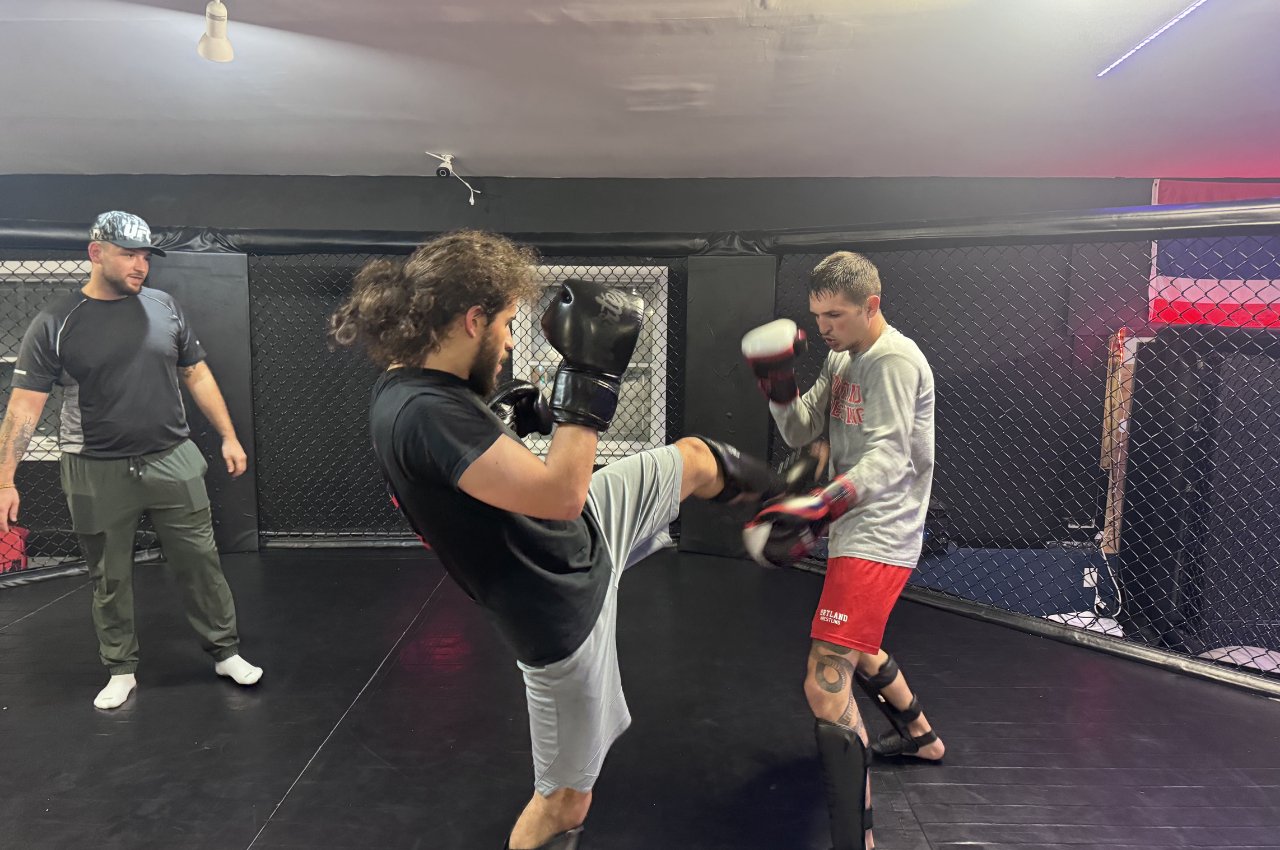 Martial arts instructor with kids