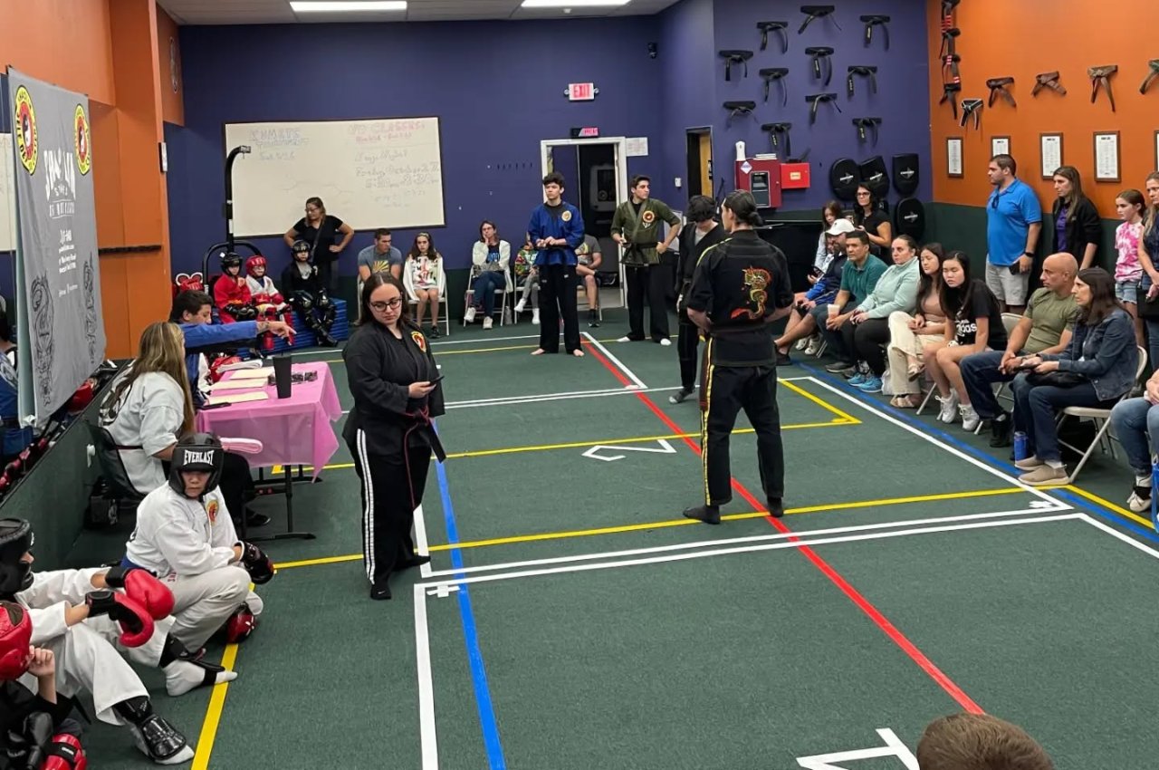 Martial arts instructor with kids