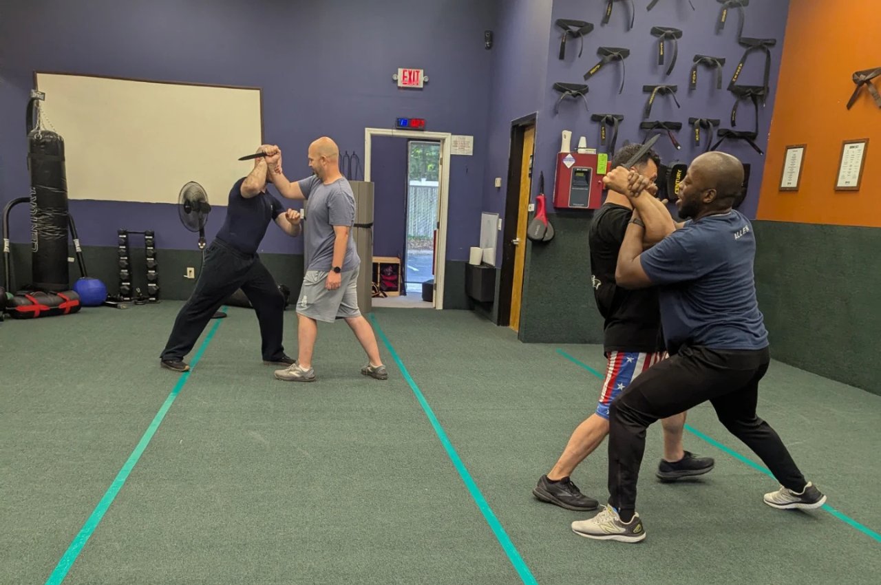 Martial arts instructor with kids