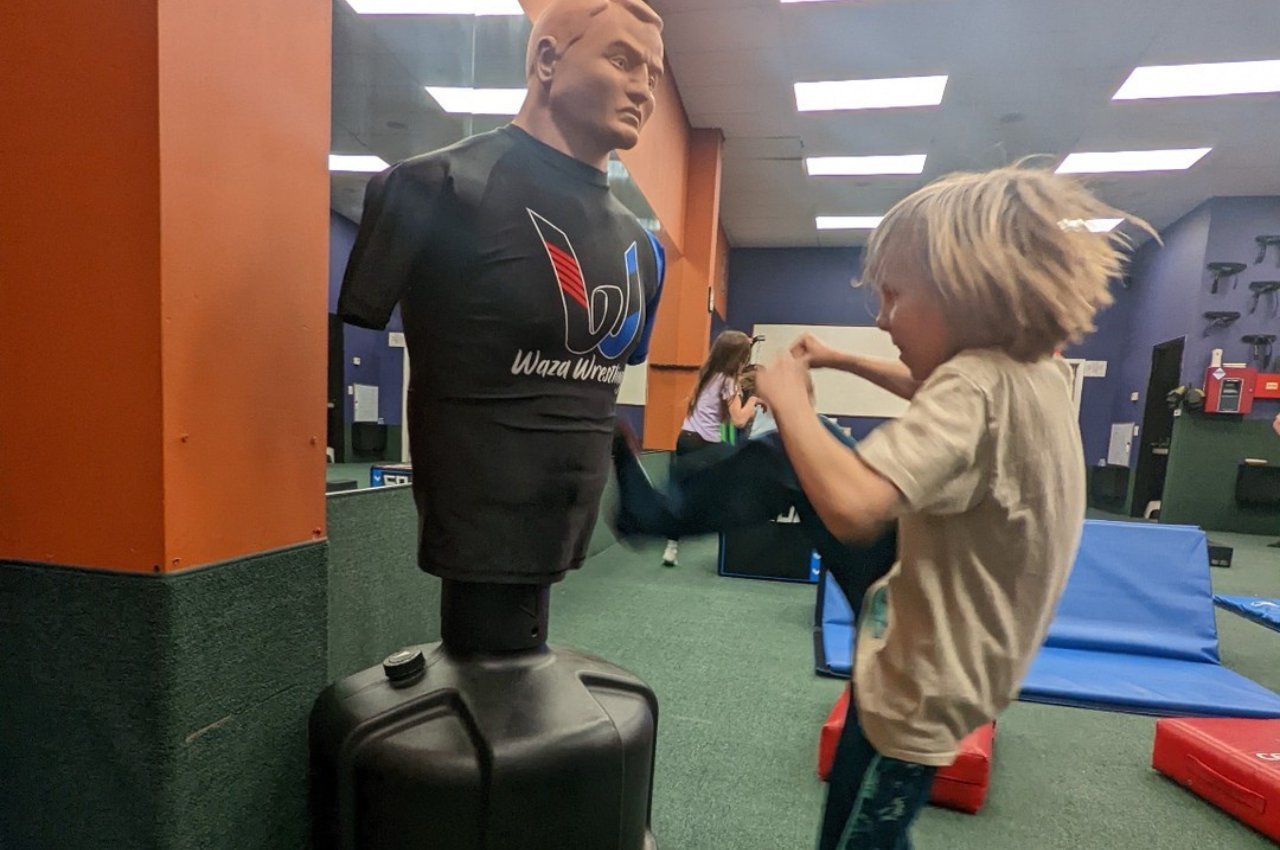 Martial arts instructor with kids