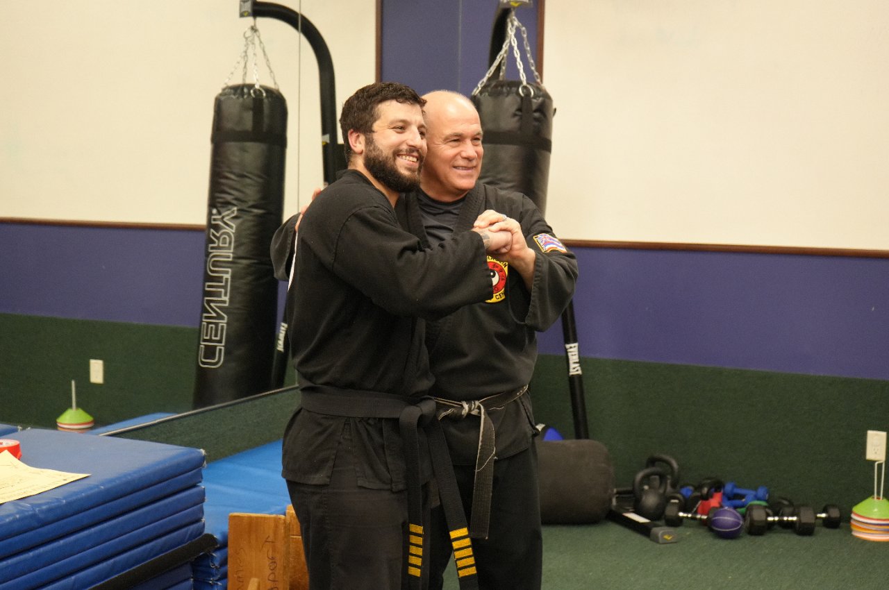 Martial arts instructor with kids