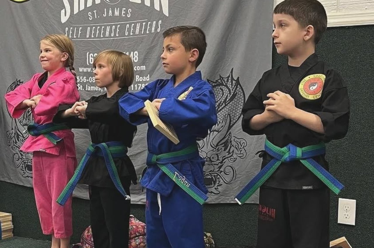 Martial arts instructor with kids