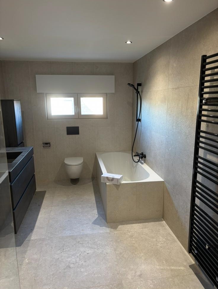 Sanitair plaatsing en herstelling in uitvoering