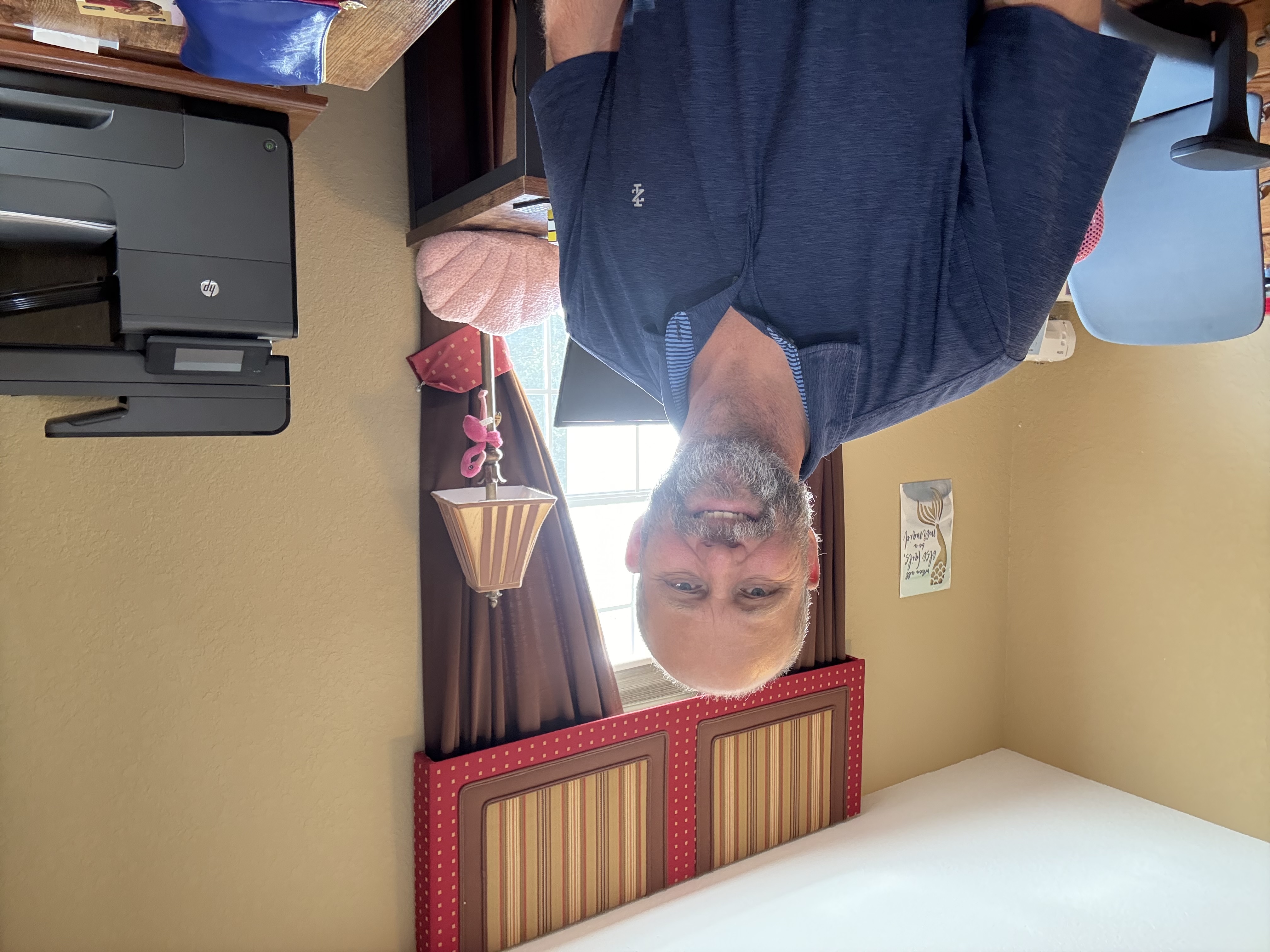 VA loan specialist smiling in home office setting, helping veterans navigate Florida home financing with expert mortgage guidance. VA loan specialist smiling in home office setting, helping veterans navigate Florida home financing with expert mortgage guidance.