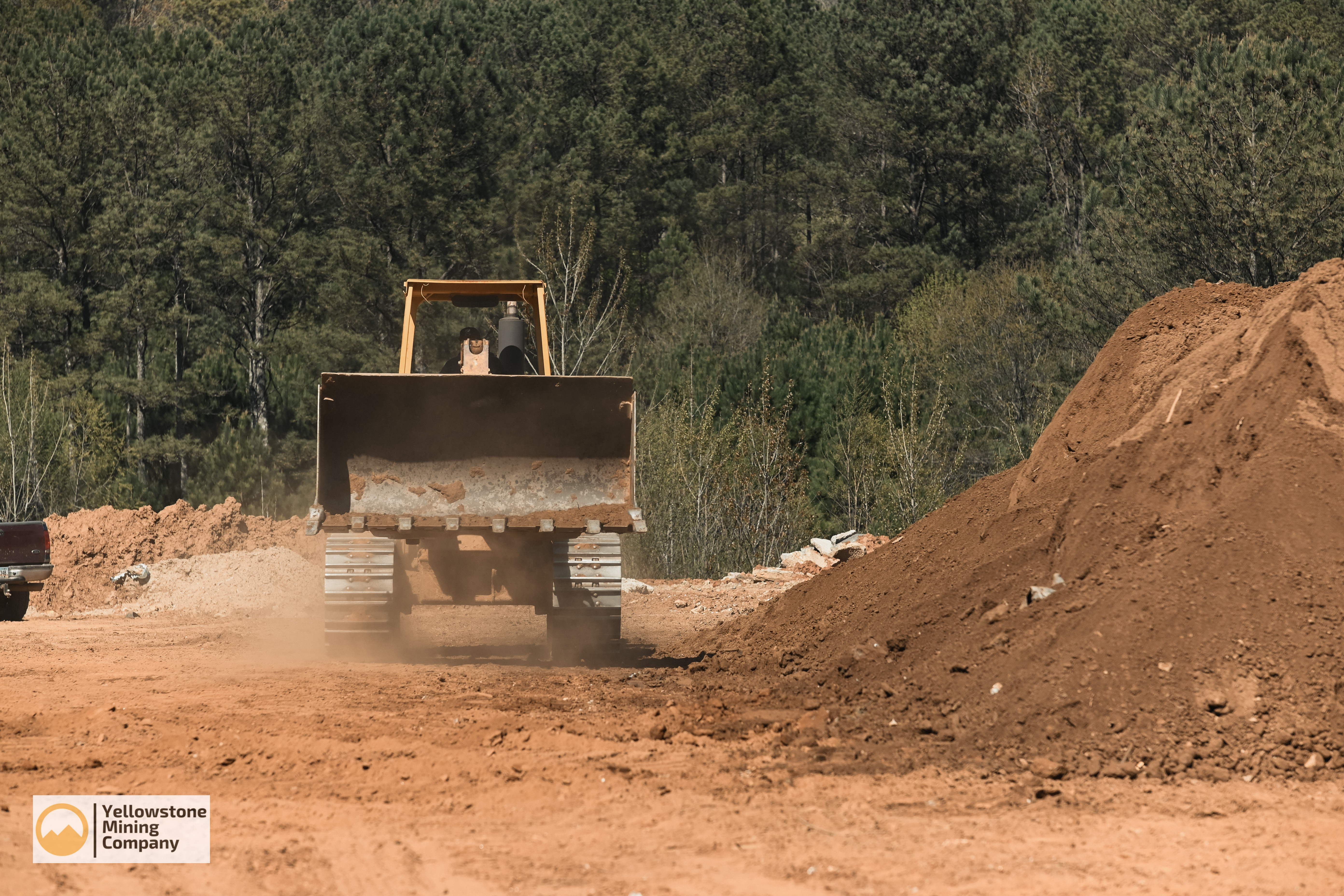Truck picking up screened topsoil