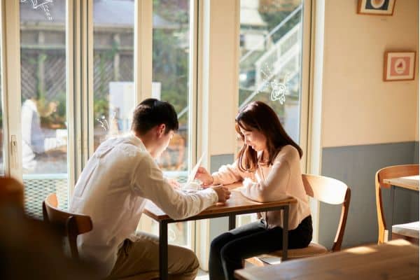 couple planning wedding together couple planning wedding together