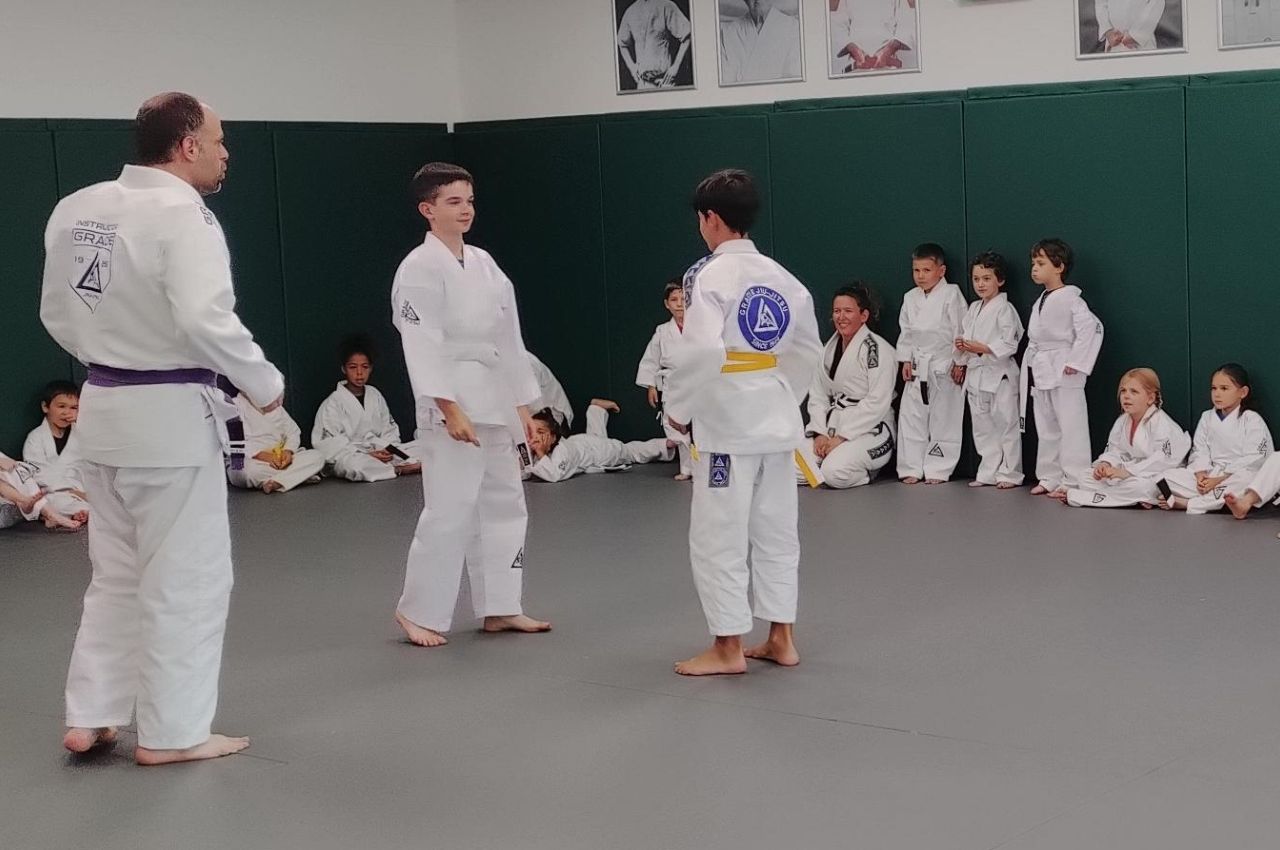 Martial arts instructor with kids