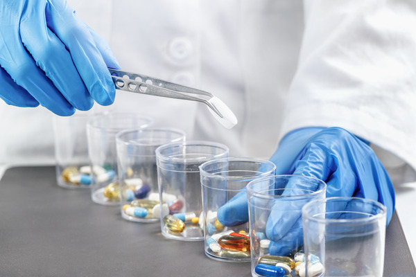 a scientist conducts drug research with expertise in the lab
