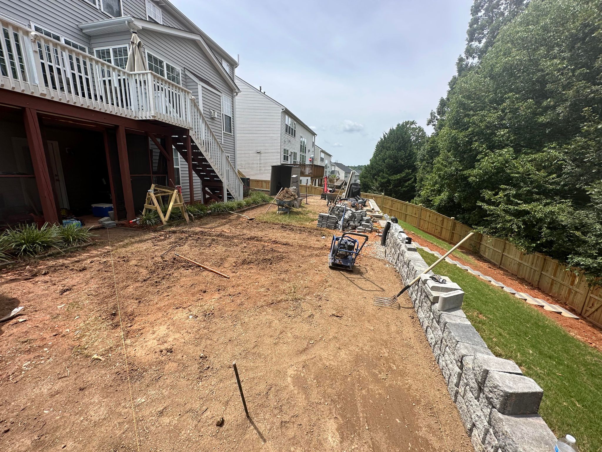 Retaining Wall Installation Durham NC – Sloped Yard Before and After