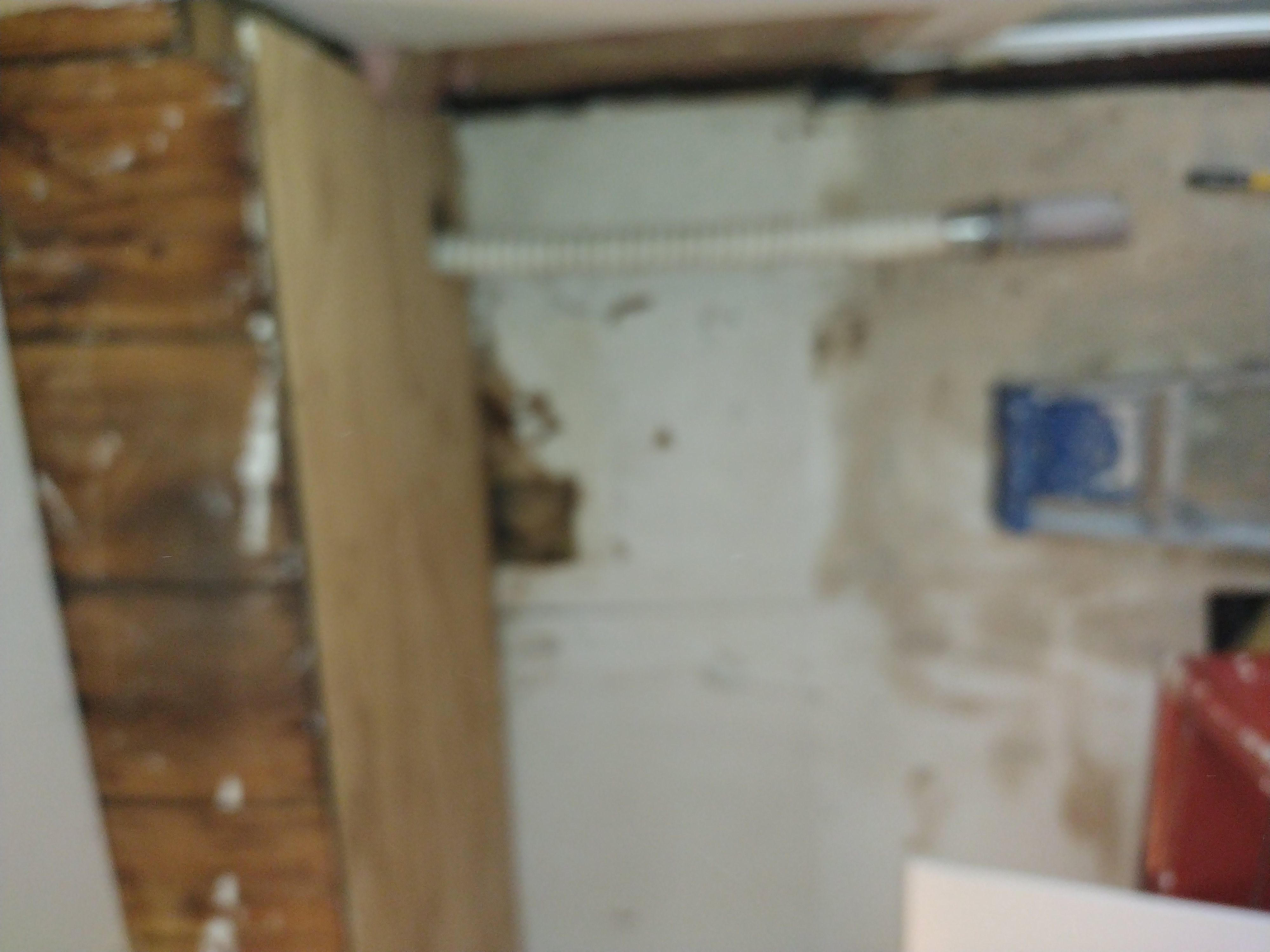 Before Scott does necessary drywall repairs