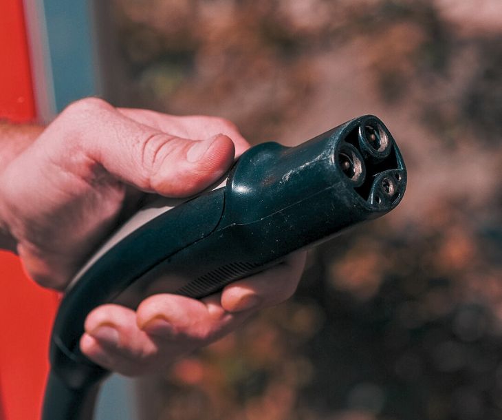 Close-up of a North American Charging Standard compatible EV charging port.