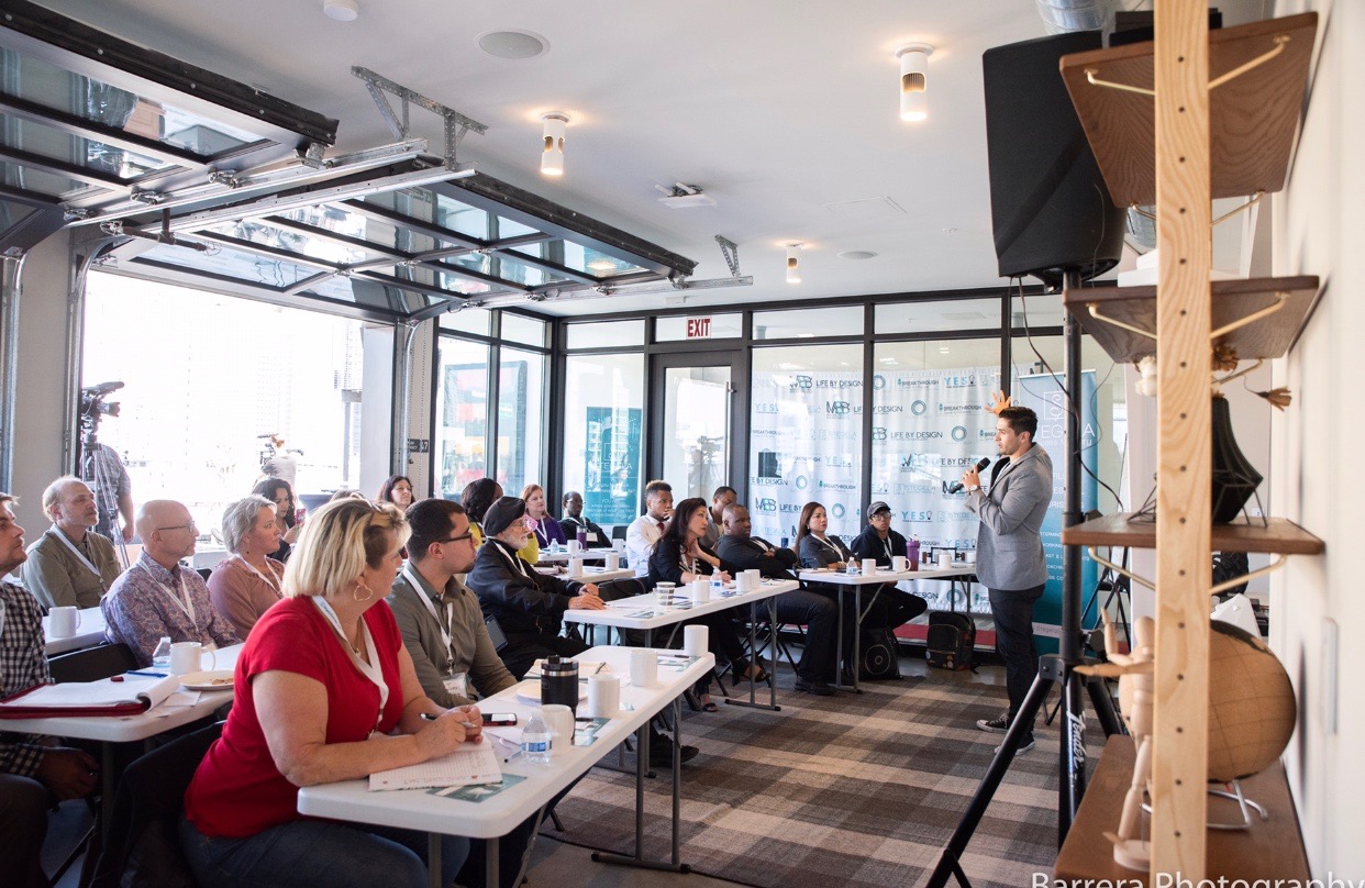 Joey Wilder presenting a masterclass on branding identity.