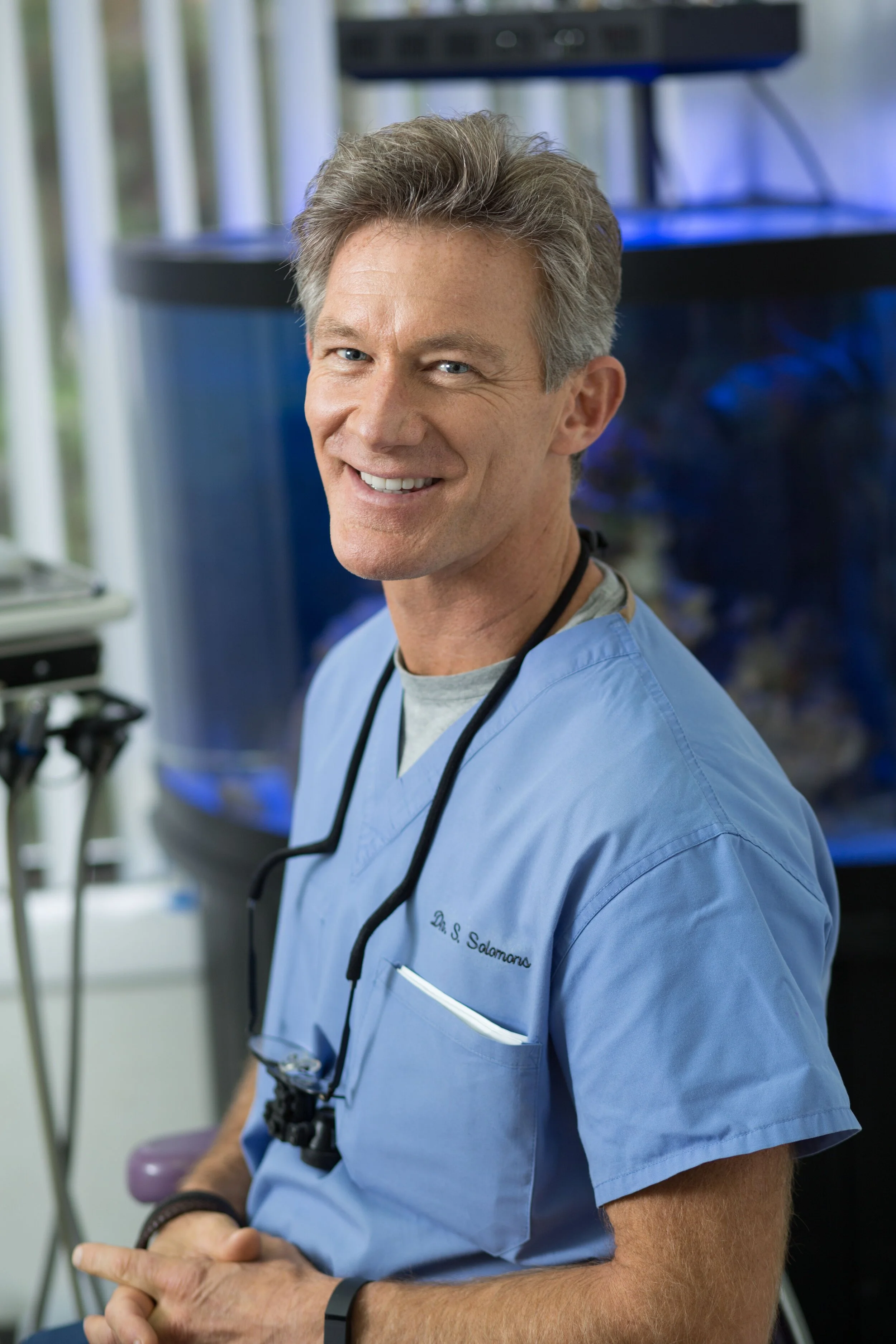 Dr. Scot Solomons, DDS is a General Dentist with over 35 years of experience, blending modern dentistry with nutrition, integrative, and wellness care. A partner at Dental Associates of CT since 1989, he provides comprehensive care alongside a multi-specialty team, ensuring patients’ dental needs are met under one roof.

He earned his DDS from Columbia University with a concentration in TMJ disorders, completed a Fellowship in Advanced General Dentistry at Fairleigh Dickinson University, and serves as an advisor to the Kresser Institute’s ADAPT Functional Medicine program.

Recognized as one of Connecticut Magazine’s Top Dentists (2018–2020), Dr. Solomons is an active member of leading dental and medical organizations, including the ADA, IAOMT, and IABDM. Guided by ancestral wisdom and a commitment to lifelong learning, he strives to create healthier, happier patients through a holistic approach to dentistry.