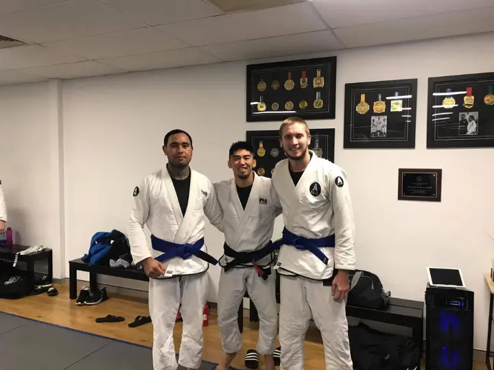 BJJ Coach and students. BJJ Coach and students.