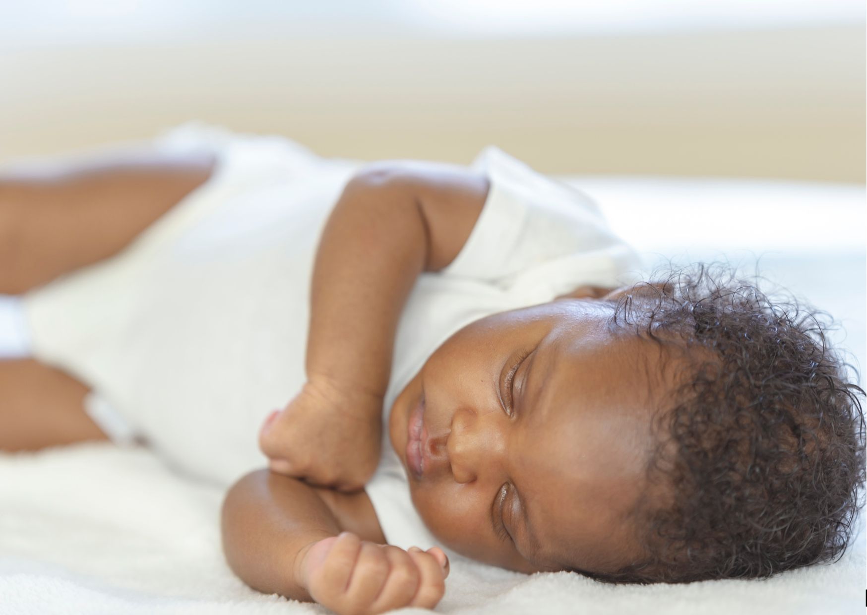 black baby asleep in crib with sleep training by brawley baby sleep solution black baby asleep in crib with sleep training by brawley baby sleep solution