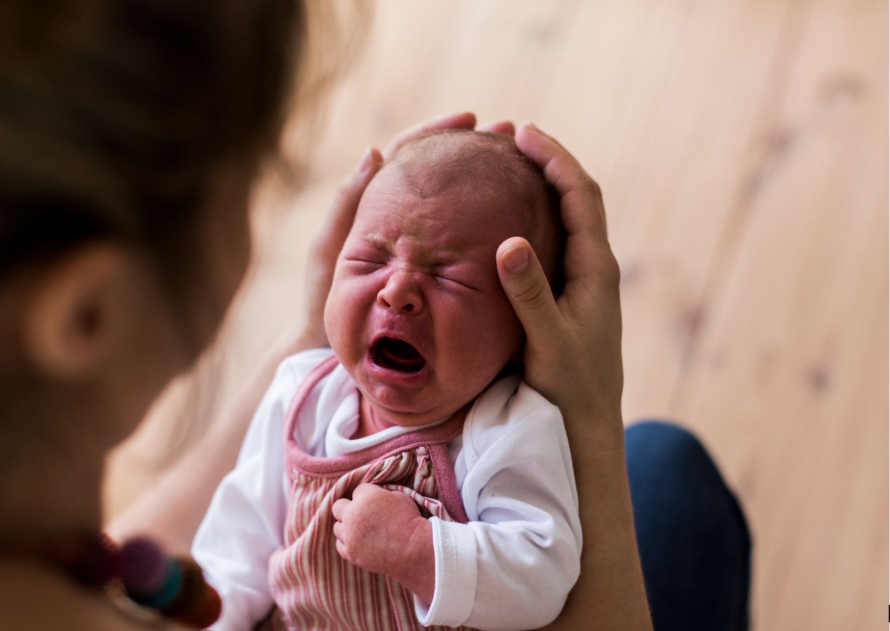 crying baby with colic crying baby with colic