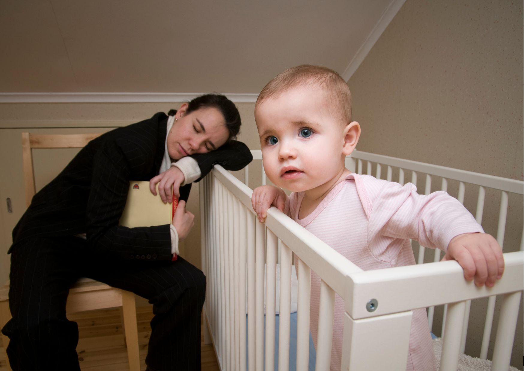 exhausted mom with baby who won't sleep
