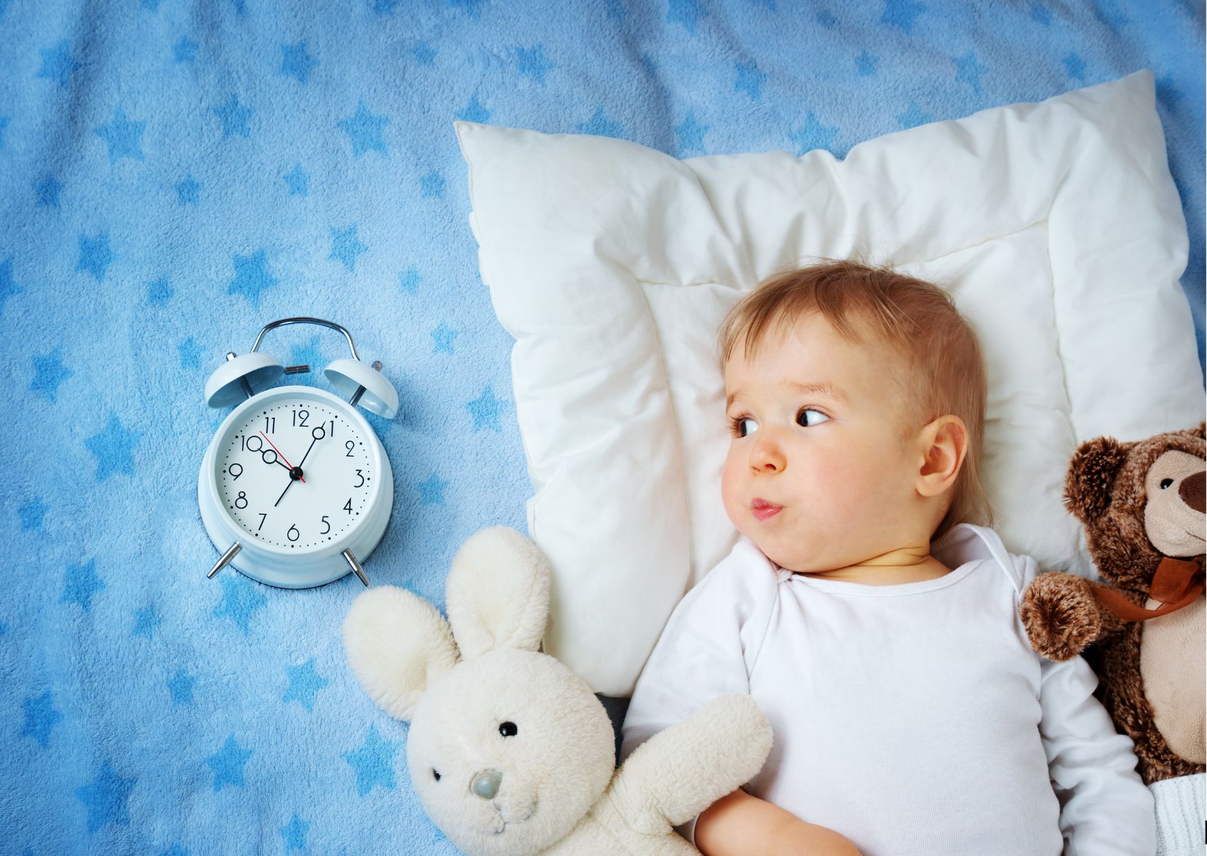 baby and a clock for daylight savings time baby and a clock for daylight savings time