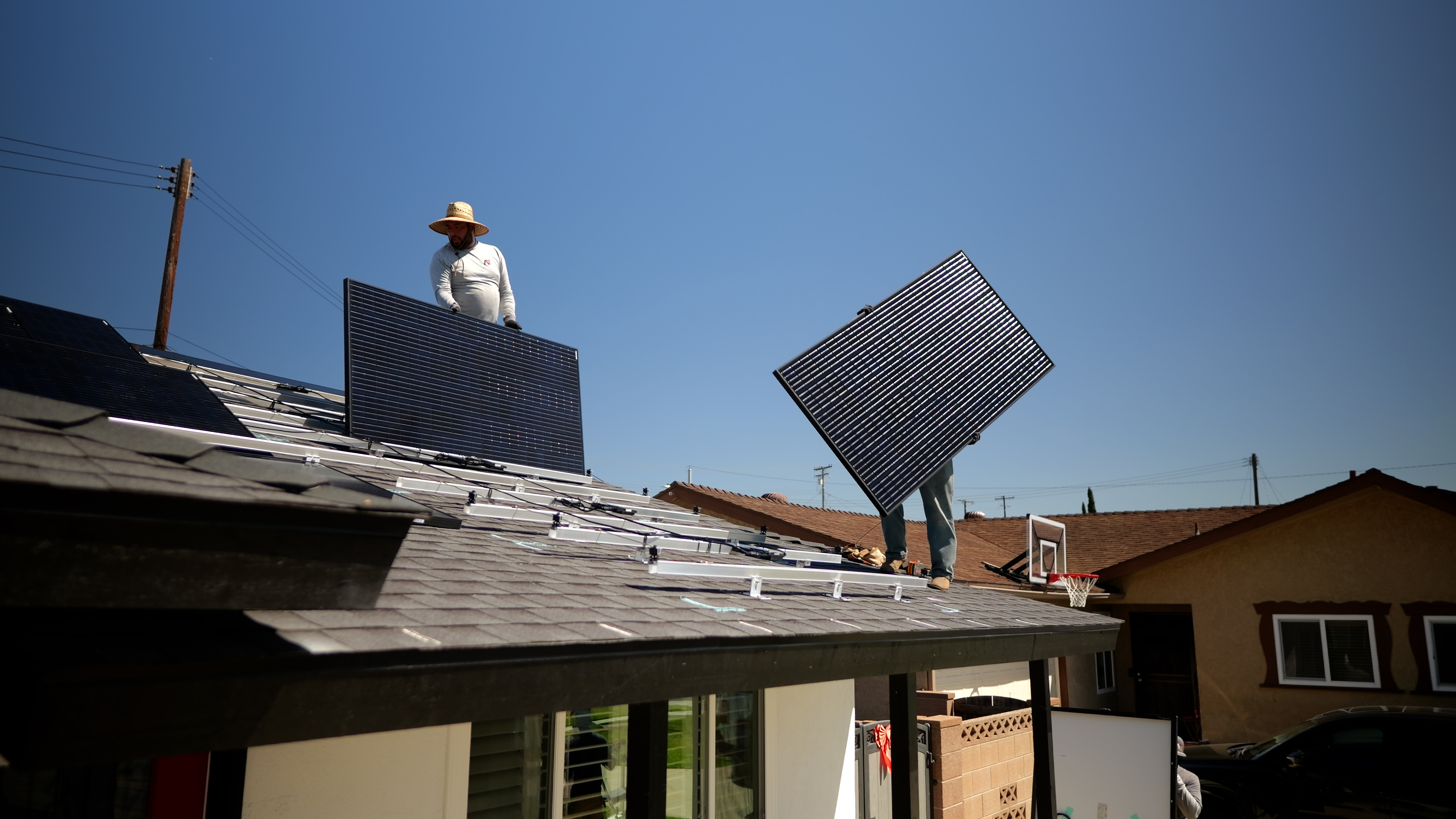 AmpSmart worker installing solar