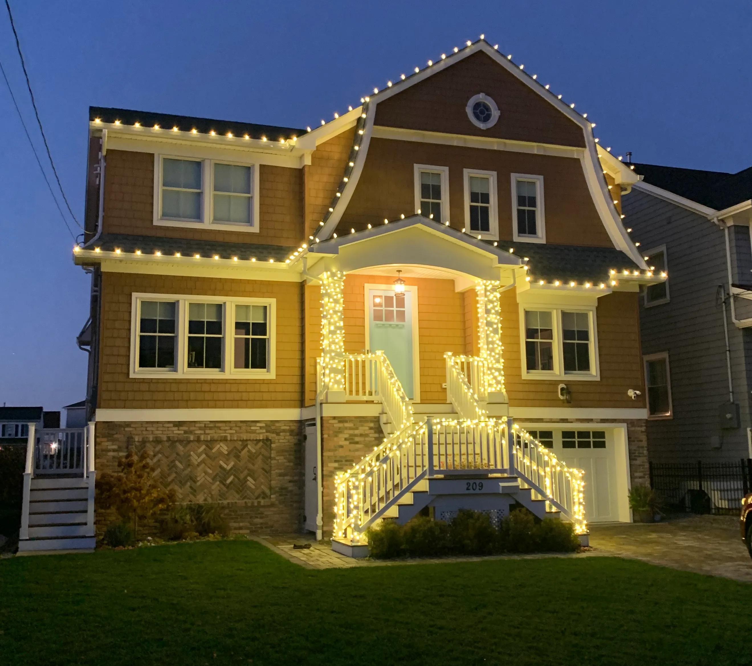 Holiday lights on a decorated home exterior in New Jersey