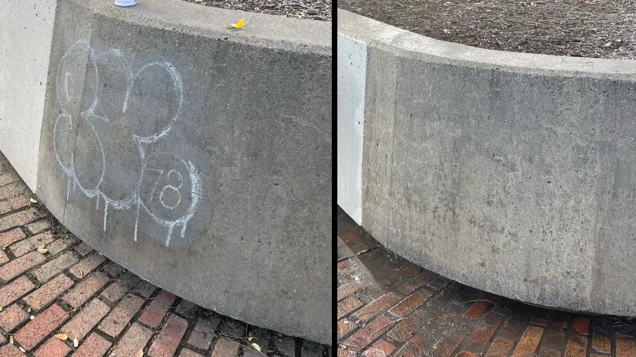 Graffiti being professionally removed from an exterior wall in New Jersey