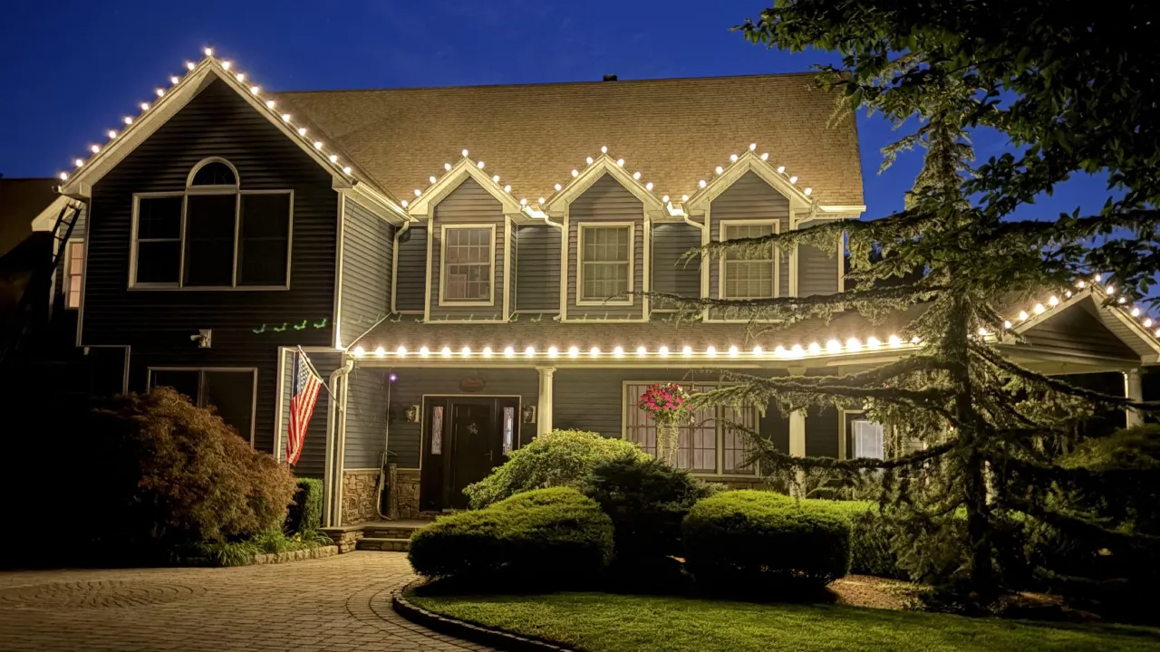 Christmas lights installed along roofline of Monmouth County home