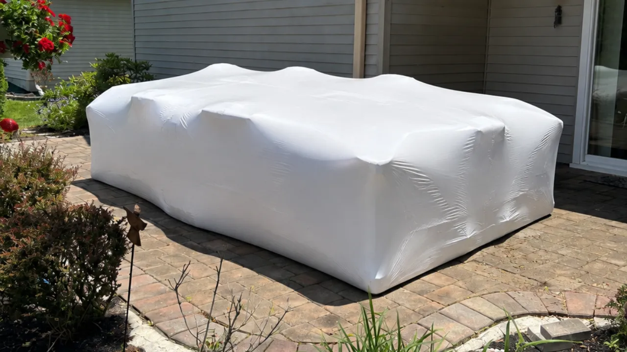 Shrink wrapped outdoor patio furniture protected for winter