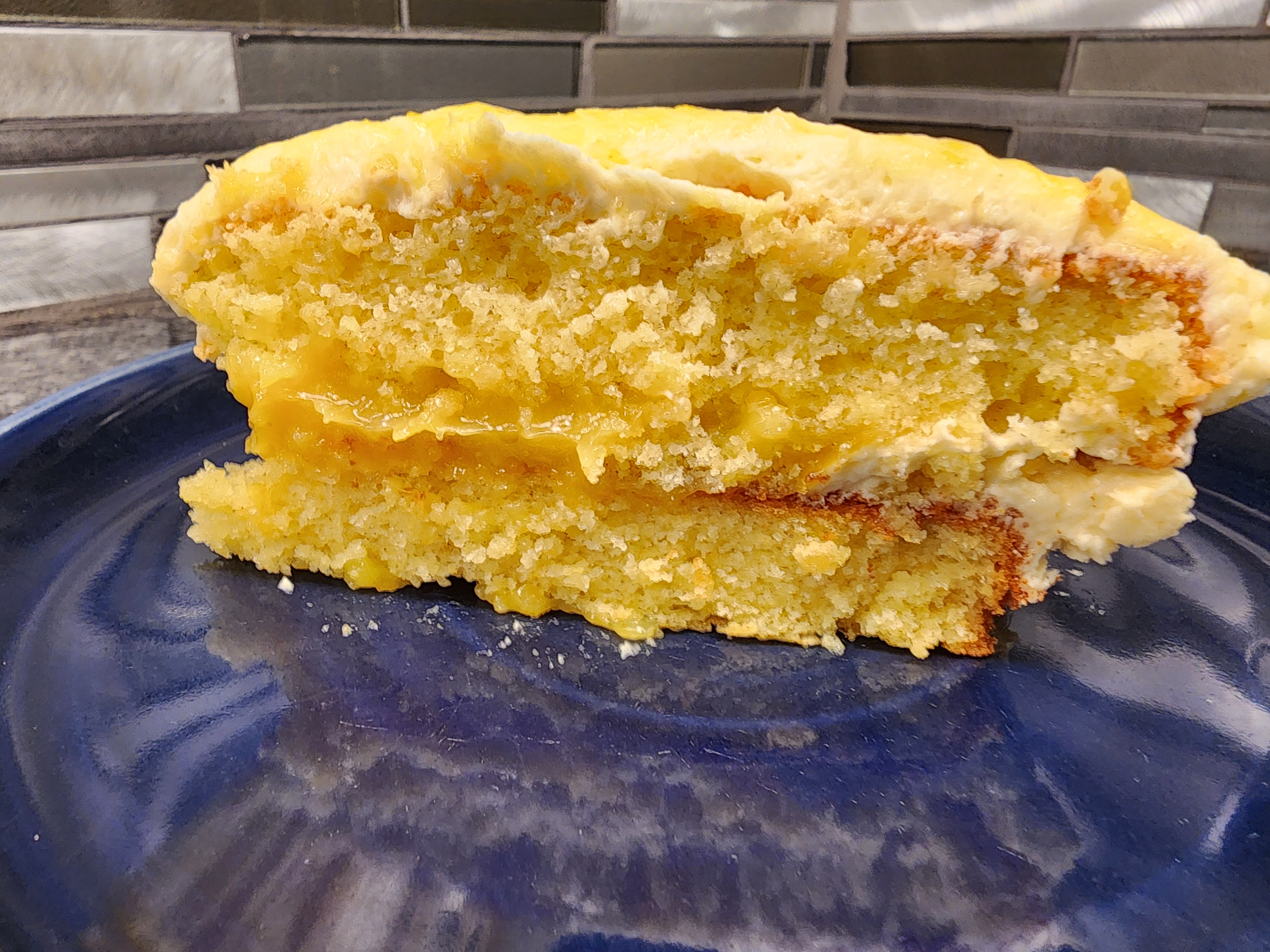 Slice of Gluten Free Lemon Curd Lemon Cake