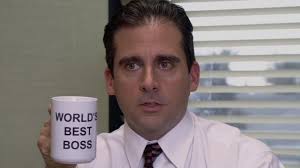 Image of The Office US Character Michael holding a mug stating World's Best Boss Image of The Office US Character Michael holding a mug stating World's Best Boss