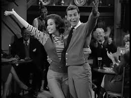 Black and White Image from the American TV show The Dick Van Dyke Show featuring Dick Van Dyke and Mary Tyler Moore. Black and White Image from the American TV show The Dick Van Dyke Show featuring Dick Van Dyke and Mary Tyler Moore.