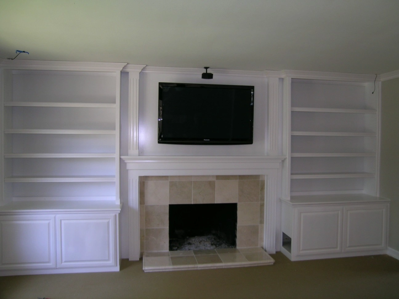 an entertainment center with television