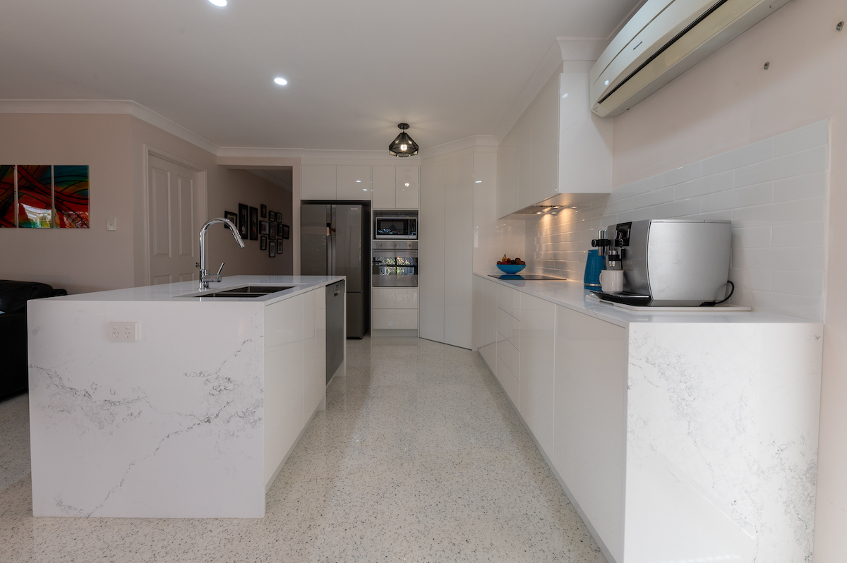 Luxurious kitchen with high-end finishes and lighting