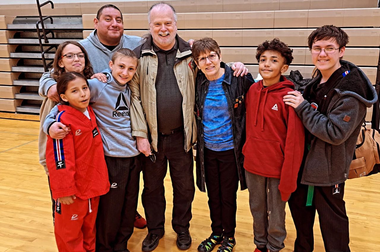 Martial arts instructor with kids