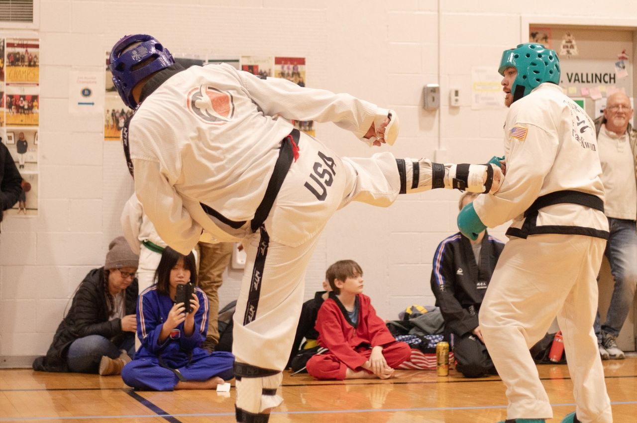 Martial arts instructor with kids