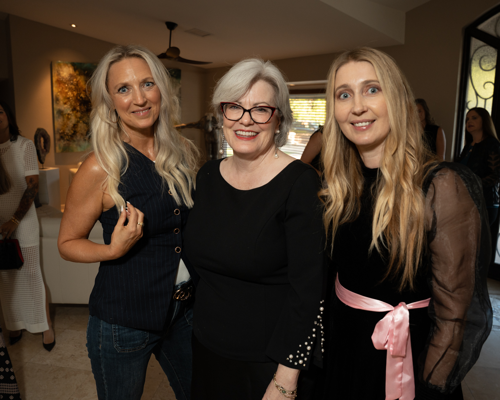 Three women community gathering