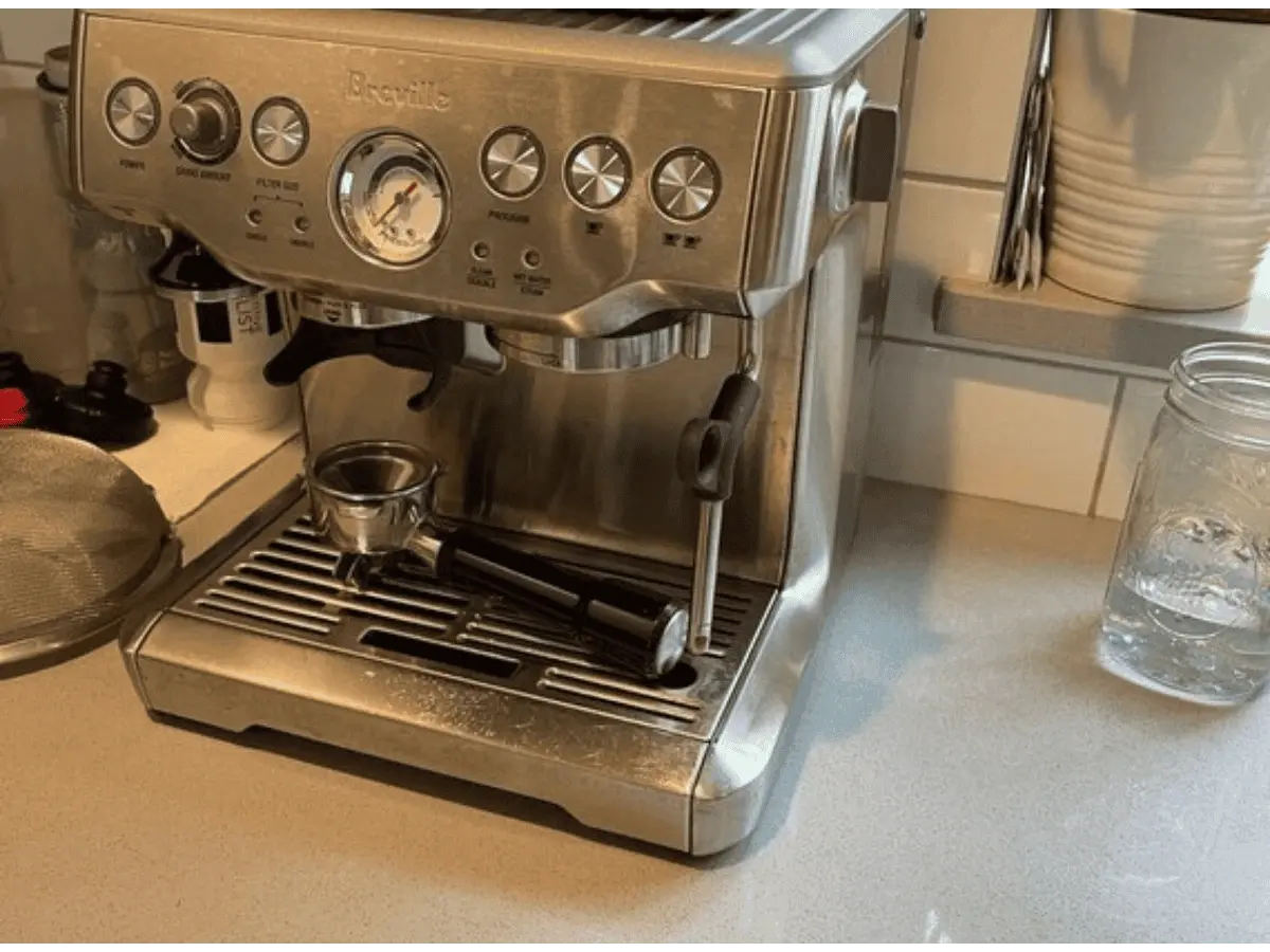 alt="After photo of the same espresso machine, now sparkling clean and fully sanitized by our Maryland appliance cleaning service."