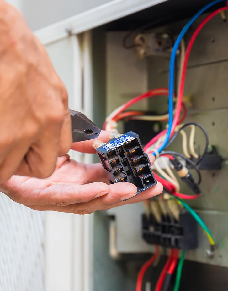 HVAC technician servicing equipment