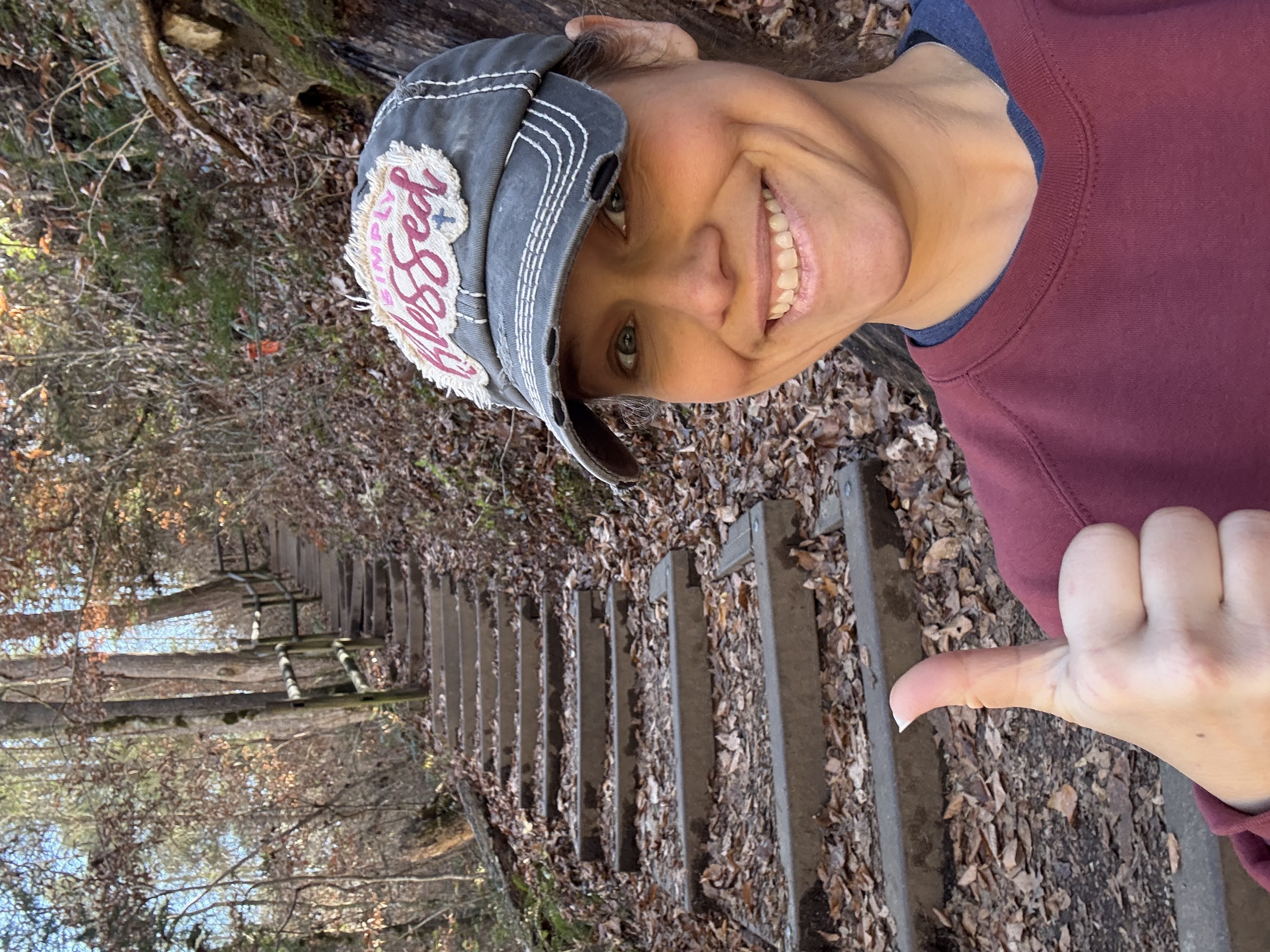 Vicki standing in front of rocky steps Vicki standing in front of rocky steps
