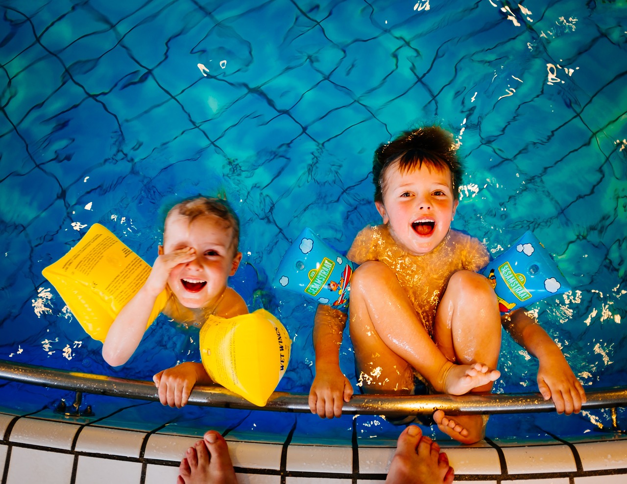 kids swimming in the pool
