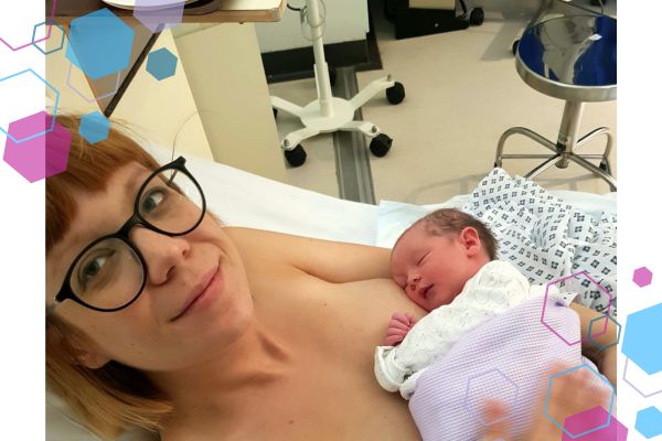 Gemma lying on a hospital bed holding her baby, at Lister Hospital Consultant Led Unit after her fast birth with hypermobility syndrome.