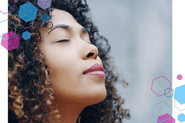 A close up image of a woman's face who is facing to the side, her eyes closed and her head lifted towards the sky. She is practicing slow, controlled breathing to release endorphins into her body. A close up image of a woman's face who is facing to the side, her eyes closed and her head lifted towards the sky. She is practicing slow, controlled breathing to release endorphins into her body.